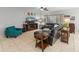 Bright living room with comfortable seating, neutral decor, and a large window for ample natural light at 16375 W Cortez St, Surprise, AZ 85388