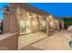Outdoor patio with misting system, ceiling fans, dining and lounge furniture, perfect for outdoor living at 16375 W Cortez St, Surprise, AZ 85388