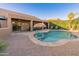Backyard pool with a covered patio, perfect for outdoor entertainment at 16375 W Cortez St, Surprise, AZ 85388