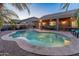 Inviting backyard pool with patio area, ideal for outdoor gatherings at 16375 W Cortez St, Surprise, AZ 85388