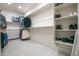Spacious walk-in closet with shelving, drawers and rod space for organized storage at 16772 W Cypress St, Goodyear, AZ 85395