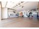 Spacious three car garage with an epoxy floor and ample storage and hanging space at 16772 W Cypress St, Goodyear, AZ 85395