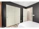 Bedroom featuring a large sliding door closet and neutral colored flooring at 1680 E Cardinal Dr, Casa Grande, AZ 85122