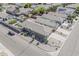 Aerial view of home with backyard including turf area, patio set, and desert landscaping at 1769 E Jacob St, San Tan Valley, AZ 85140