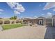Spacious backyard with turf area, patio set, playset, and shed at 1769 E Jacob St, San Tan Valley, AZ 85140