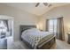 Comfortable primary bedroom features an ensuite bathroom and relaxing color palette at 1769 E Jacob St, San Tan Valley, AZ 85140