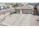 Well-maintained single-story home with a desert landscape, long driveway and two-car garage at 1769 E Jacob St, San Tan Valley, AZ 85140