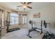 Home gym featuring exercise equipment, neutral paint, and natural lighting at 1769 E Jacob St, San Tan Valley, AZ 85140
