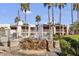 Picturesque community with a water fountain, lush landscaping, and resort-style living at 205 N 74Th St # 166, Mesa, AZ 85207