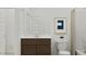 Bathroom featuring a sleek vanity, toilet, framed mirror and a shower with a curtain at 20901 S 231St Way, Queen Creek, AZ 85142