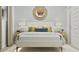 Bedroom showcasing a woven mirror, chic nightstands, and soft, inviting decor at 20901 S 231St Way, Queen Creek, AZ 85142