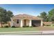 Charming single-story home with a tile roof, well-manicured lawn, and a two-car garage at 20901 S 231St Way, Queen Creek, AZ 85142