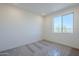 Bedroom featuring neutral carpet, fresh paint and lots of natural light at 2121 W Sonoran Desert Dr # 32, Phoenix, AZ 85085