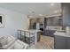 This spacious kitchen features a large island, stainless steel appliances, and dark wood cabinetry at 2121 W Sonoran Desert Dr # 32, Phoenix, AZ 85085