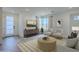 A light-filled living room with a view of the desert landscape and an inviting seating arrangement at 2121 W Sonoran Desert Dr # 32, Phoenix, AZ 85085