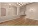Elegant entryway showcasing recessed lighting and wood floors at 2183 W Hawken Way, Chandler, AZ 85286