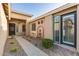 Home showcasing a desert style landscape, brick entryway and a fountain at 2183 W Hawken Way, Chandler, AZ 85286
