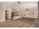 Open floor plan featuring hard wood floors, recessed lighting, archways, and lots of natural light at 2183 W Hawken Way, Chandler, AZ 85286