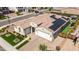 Aerial view of property displaying desert landscaping, solar panels, a front yard, and well-manicured green spaces at 22721 N 34Th St, Phoenix, AZ 85050