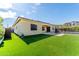 Expansive backyard featuring lush artificial turf, offering a serene outdoor space at 22721 N 34Th St, Phoenix, AZ 85050