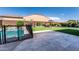 Wide backyard view showcasing artificial turf, a gazebo, playground, and a secure pool area at 22721 N 34Th St, Phoenix, AZ 85050