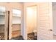 Modern bathroom with a toilet room, walk-in closet, and black marble floor at 22721 N 34Th St, Phoenix, AZ 85050