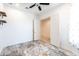 Minimalist bedroom featuring tile floors and shelves, awaiting personalization at 22721 N 34Th St, Phoenix, AZ 85050