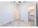 Bright bedroom featuring an en-suite closet and modern tile flooring at 22721 N 34Th St, Phoenix, AZ 85050