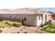 Side view of the home showing the desert-landscaped yard and tiled roof at 22721 N 34Th St, Phoenix, AZ 85050