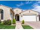 Charming home featuring a landscaped front yard, beautiful shrubbery and a paver driveway at 22721 N 34Th St, Phoenix, AZ 85050