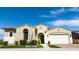 Charming single-story home with desert landscaping and inviting front yard, complete with a two-car garage at 22721 N 34Th St, Phoenix, AZ 85050