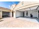 Spacious three-car garage with modern epoxy floors and ample lighting, perfect for car enthusiasts and storage at 22721 N 34Th St, Phoenix, AZ 85050