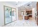 Open kitchen featuring a marble island, leading to an outdoor patio area and a modern layout at 22721 N 34Th St, Phoenix, AZ 85050