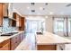 Modern kitchen with stainless steel appliances, granite countertops, and a large island at 22721 N 34Th St, Phoenix, AZ 85050