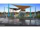 Vibrant splash pad and playground with slides, climbing structures, and comfortable seating at 22721 N 34Th St, Phoenix, AZ 85050