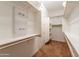 Spacious walk-in closet with shelves and rod, providing ample storage at 22721 N 34Th St, Phoenix, AZ 85050