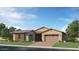 Beautiful single-Gathering home featuring a two-car garage, desert landscaping, and a neutral color palette at 23109 E Nightingale Rd, Queen Creek, AZ 85142