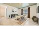 Inviting game room featuring a billiards table, bar seating, and stylish decor at 23109 E Nightingale Rd, Queen Creek, AZ 85142