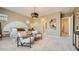 Comfortable main bedroom with a neutral color scheme, plush carpeting, and modern decor at 23109 E Nightingale Rd, Queen Creek, AZ 85142