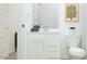 Clean bathroom with white vanity, modern fixtures, and a neutral color palette at 23139 E Lords Way, Queen Creek, AZ 85142