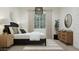Well-appointed bedroom featuring stylish furnishings, soft lighting, and a relaxing atmosphere at 23139 E Lords Way, Queen Creek, AZ 85142