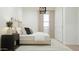 Serene bedroom featuring neutral tones, soft lighting, and a minimalist design at 23139 E Lords Way, Queen Creek, AZ 85142