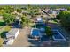 Aerial showcases in-ground pool, outbuilding and pristine landscaping, enhancing outdoor living at 2724 W Colt Rd, Chandler, AZ 85224
