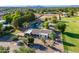 Aerial view showcases the property's expansive land, pool, barn, and beautiful landscaping at 2724 W Colt Rd, Chandler, AZ 85224