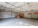Inside barn with built-in cabinetry, pegboard walls, and concrete floors for versatile use at 2724 W Colt Rd, Chandler, AZ 85224