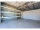 Large barn interior featuring open space with storage shelving against the back wall at 2724 W Colt Rd, Chandler, AZ 85224