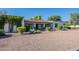 Charming single-story house with a red tile roof and a well-maintained front yard with mature trees at 2724 W Colt Rd, Chandler, AZ 85224