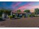 Inviting home exterior with desert landscaping and a covered entryway, offering a blend of comfort and elegance at 2724 W Colt Rd, Chandler, AZ 85224