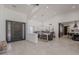 Open-concept living space with elegant furnishings, a dining area, and an entryway with a grand door at 2724 W Colt Rd, Chandler, AZ 85224