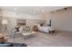 Bright and airy main bedroom with sitting area and modern decor at 2724 W Colt Rd, Chandler, AZ 85224
